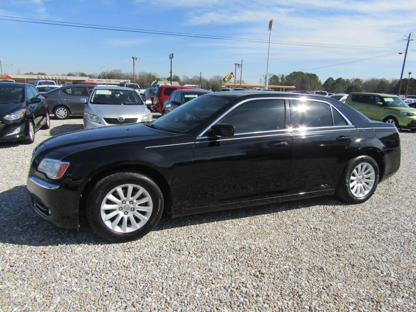 2013 Black /Tan Chrysler 300 RWD (2C3CCAAG5DH) with an 3.6L V6 SOHC 24V engine, Automatic transmission, located at 15016 S Hwy 231, Midland City, AL, 36350, (334) 983-3001, 31.306210, -85.495277 - Photo#2